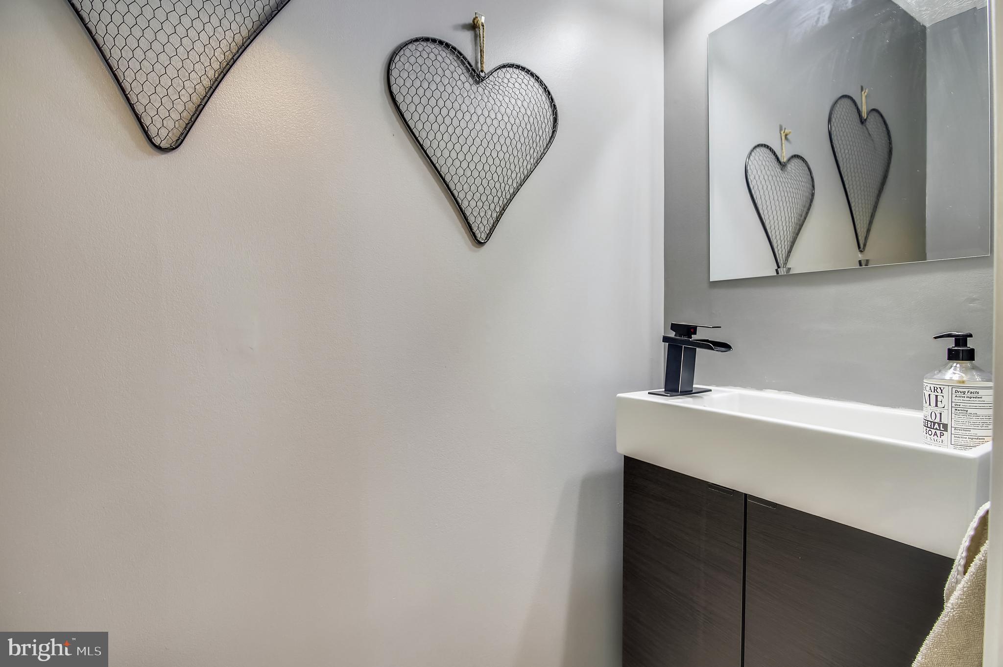 2062 Paperbark Road Baltimore, MD 21221 - Photo 14 of 34 First floor half bath