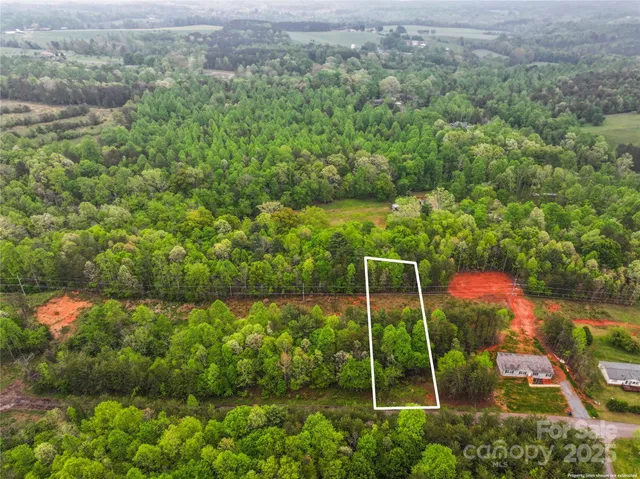 a view of a field with an outdoor space