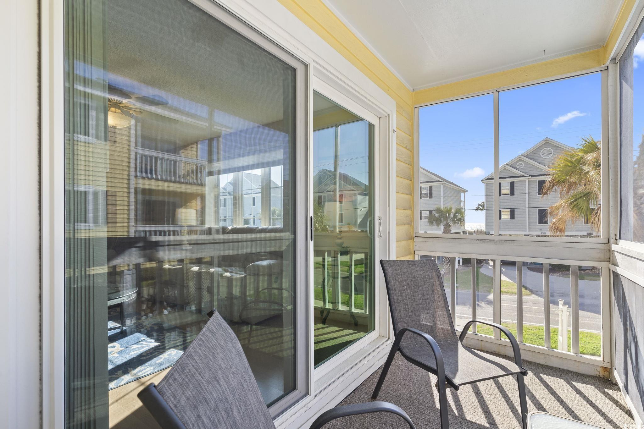 1425 North Waccamaw Drive, Unit 123 Murrells Inlet, SC 29576 - Photo 12 of 39 View of sunroom / solarium