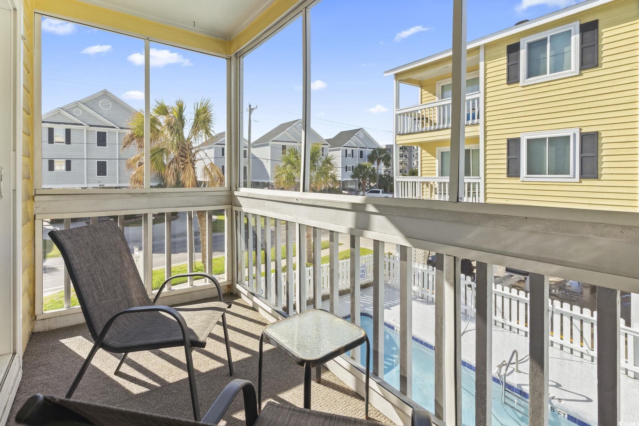1425 North Waccamaw Drive, Unit 123 Murrells Inlet, SC 29576 - Photo 13 of 39 Balcony featuring a residential view