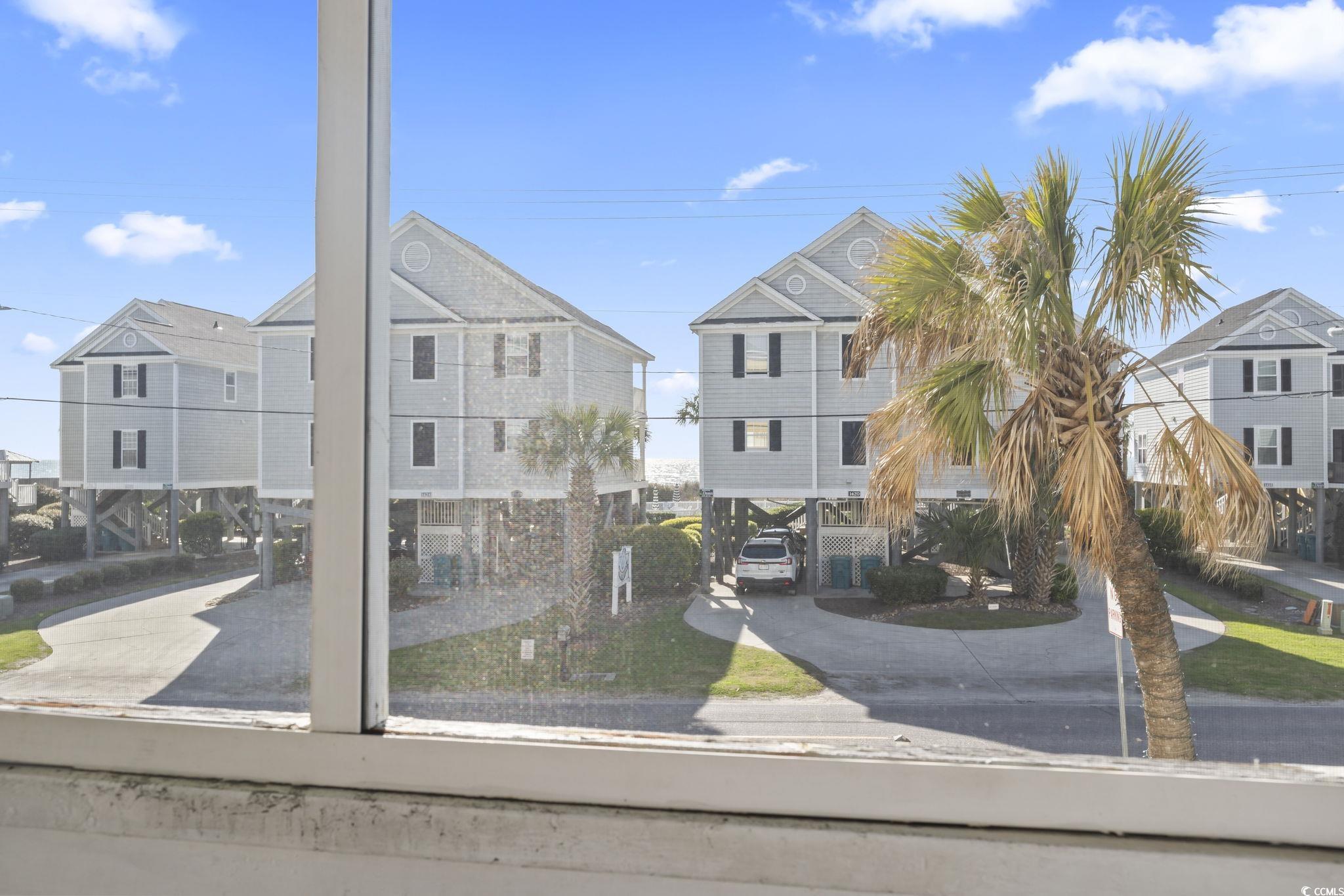 1425 North Waccamaw Drive, Unit 123 Murrells Inlet, SC 29576 - Photo 29 of 39 Balcony with a residential view