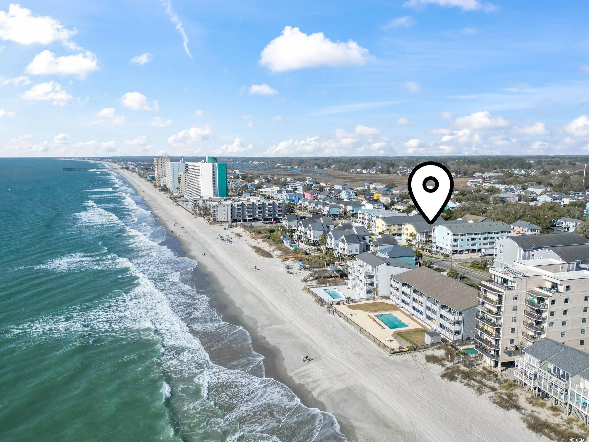 1425 North Waccamaw Drive, Unit 123 Murrells Inlet, SC 29576 - Photo 30 of 39 View of urban area with waterfront with a beach