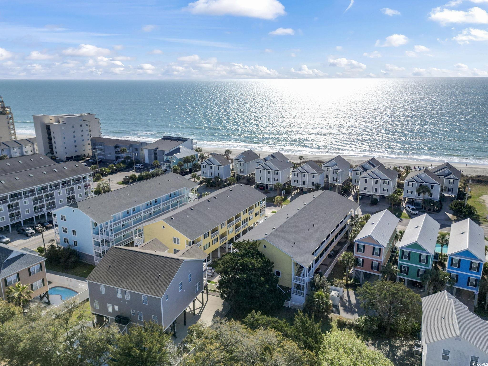 1425 North Waccamaw Drive, Unit 123 Murrells Inlet, SC 29576 - Photo 36 of 39 Bird's eye view of waterfront with a beach