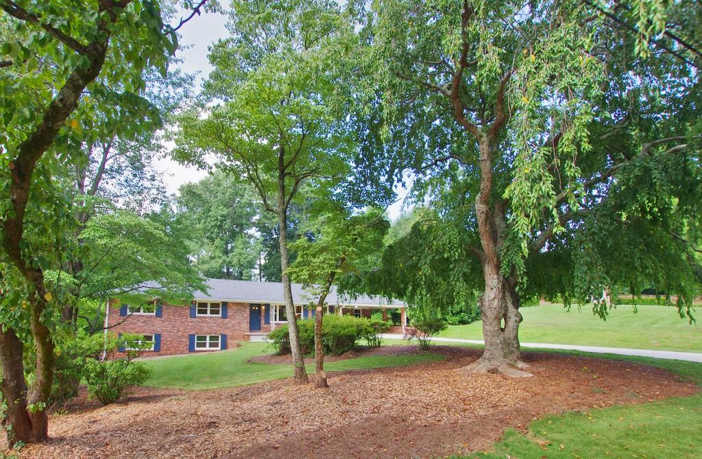 3875 Midvale Road Tucker, GA 30084 - Photo 1 of 1 a view of a park with a tree