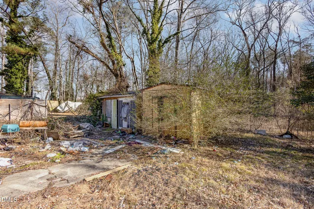 a backyard of a house with lots of green space