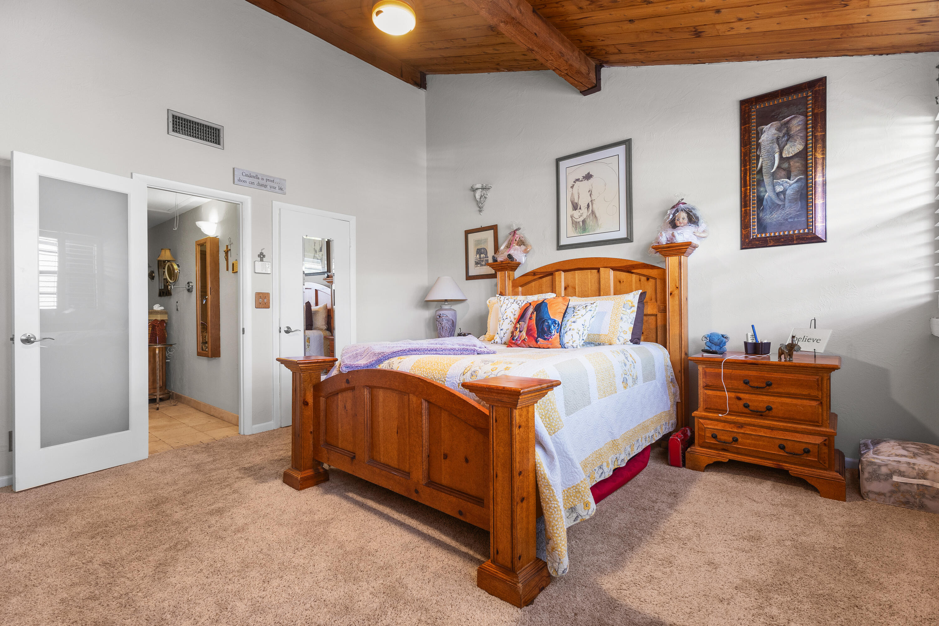 4601 Northwest 2nd Avenue, Unit 811 Boca Raton, FL 33431 - Photo 14 of 30 a spacious bedroom with a bed and a lamp