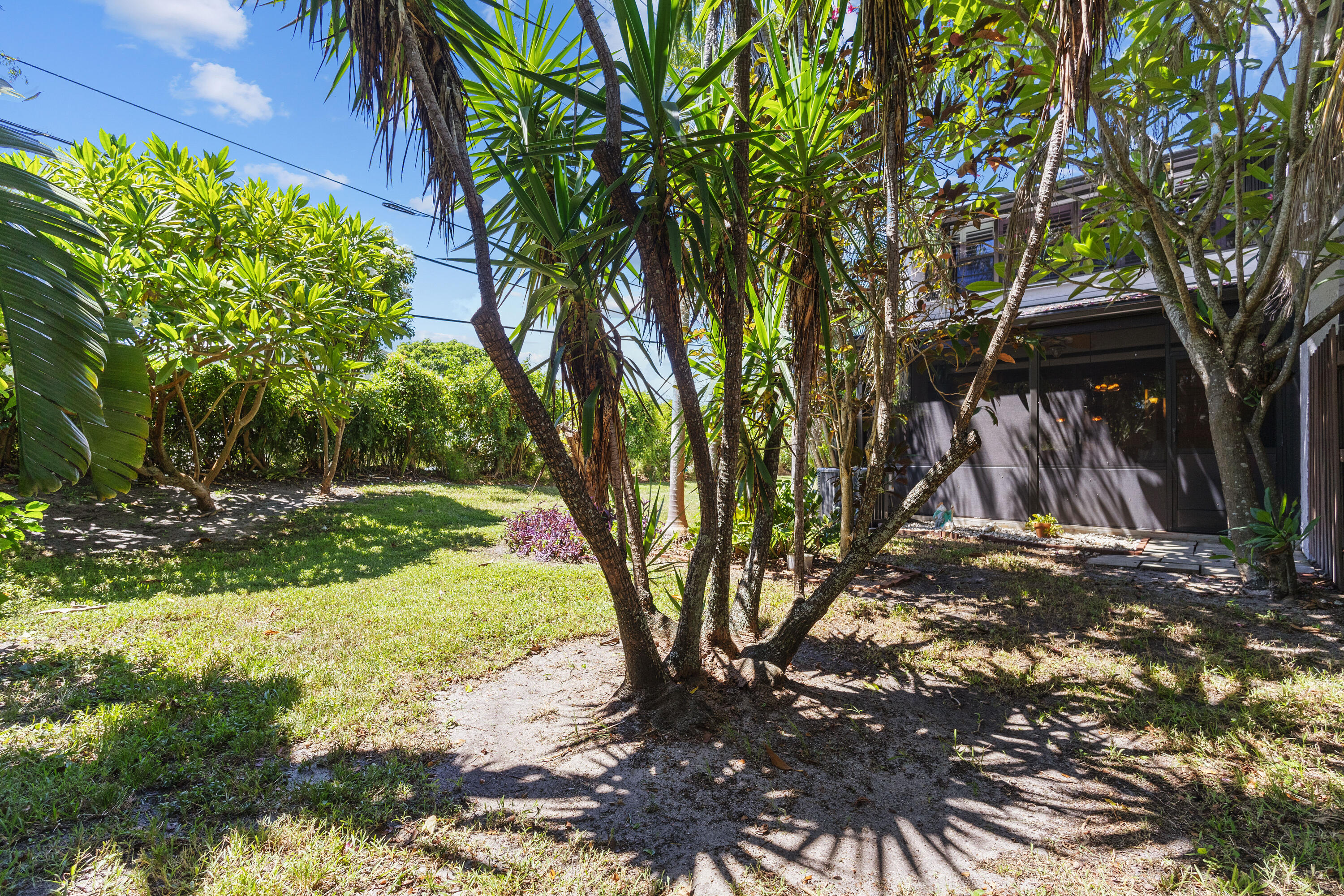 4601 Northwest 2nd Avenue, Unit 811 Boca Raton, FL 33431 - Photo 21 of 30 a view of outdoor space with trees