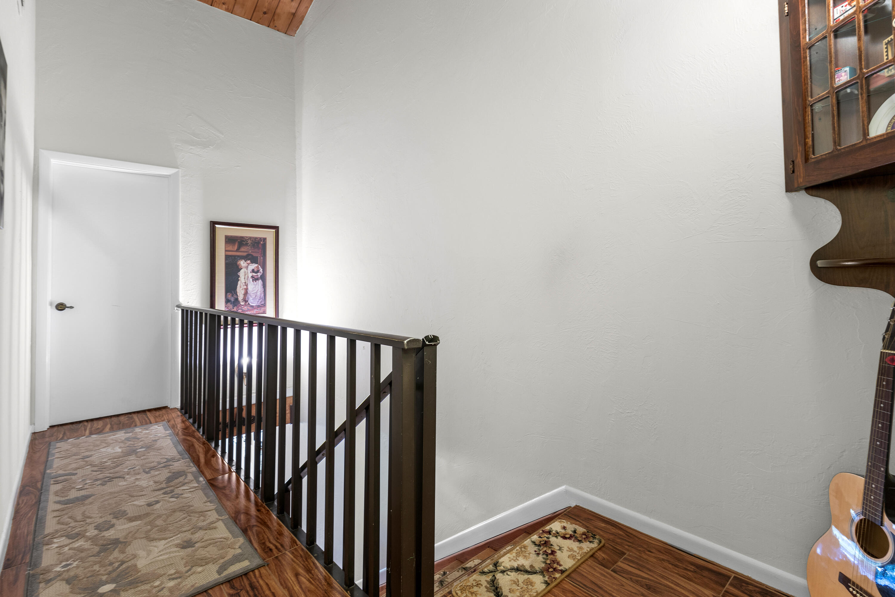 4601 Northwest 2nd Avenue, Unit 811 Boca Raton, FL 33431 - Photo 10 of 30 a view of a hallway with wooden floor and a window