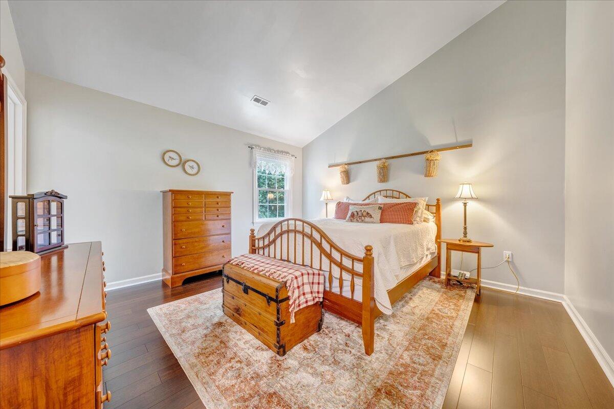 3608 Jae Valley Road Roanoke, VA 24014 - Photo 20 of 51 a bedroom with a bed and wooden floor