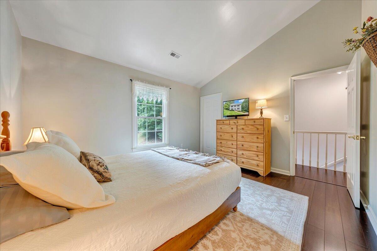 3608 Jae Valley Road Roanoke, VA 24014 - Photo 25 of 51 a bedroom with a bed and dresser with mirror