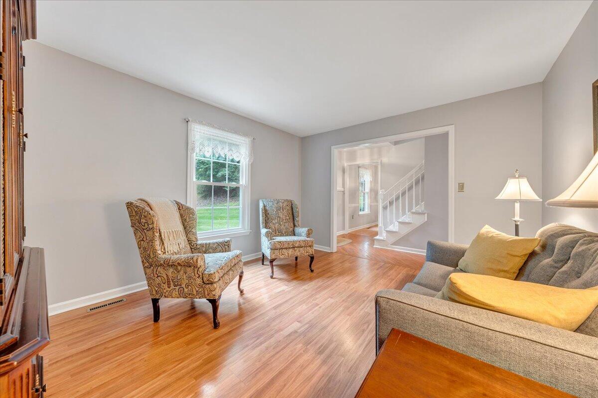 3608 Jae Valley Road Roanoke, VA 24014 - Photo 7 of 51 a living room with furniture and wooden floor