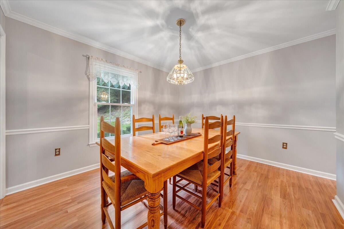 3608 Jae Valley Road Roanoke, VA 24014 - Photo 8 of 51 a view of a dining room with furniture window and wooden floor