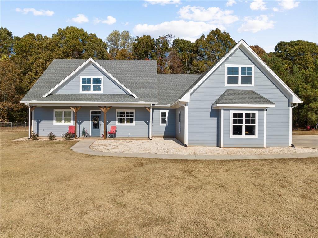 282 Crowe Road Homer, GA 30547 - Photo 1 of 1 a front view of a house with a yard and garage