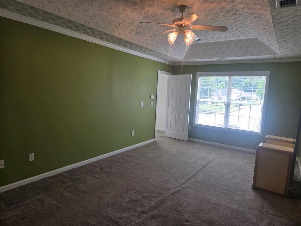22 Windcrest Keep Covington, GA 30016 - Photo 18 of 32 a view of livingroom with window and ceiling fan
