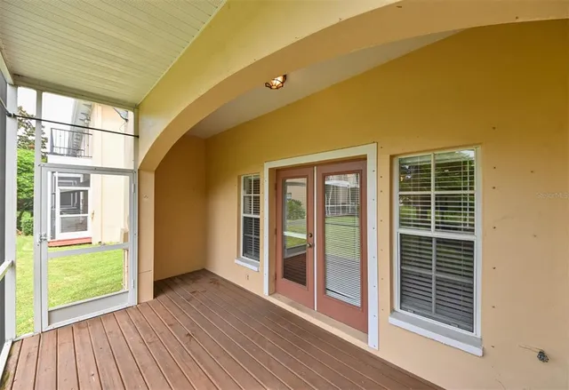 a front view of a house with a yard and a garage