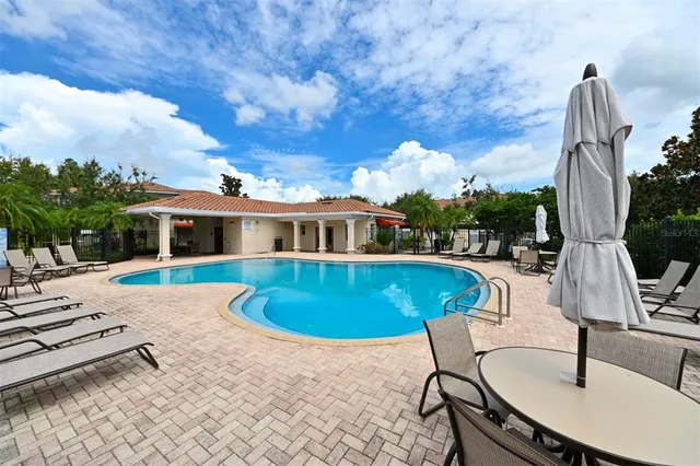 a swimming pool with lake view