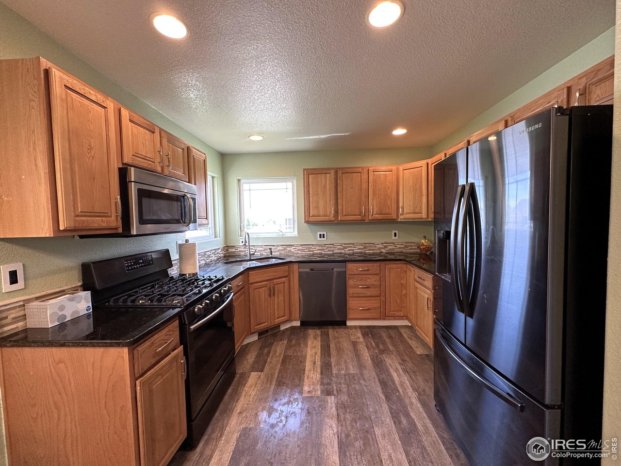7001 McClellan Road Wellington, CO 80549 - Photo 6 of 20 Granite kitchen counters all appliances stay!