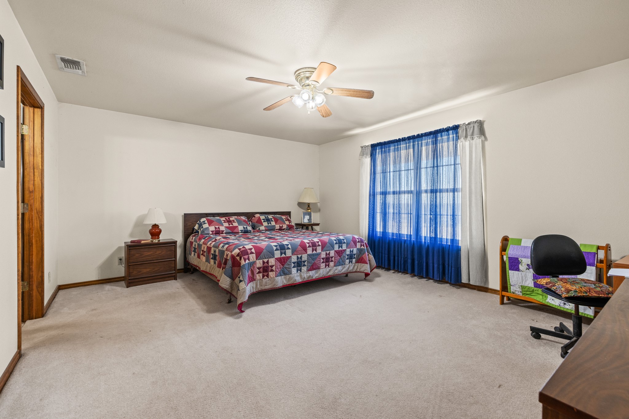 2020 Wendel Road Harper, TX 78631 - Photo 16 of 40 Carpeted bedroom with ceiling fan and an office area