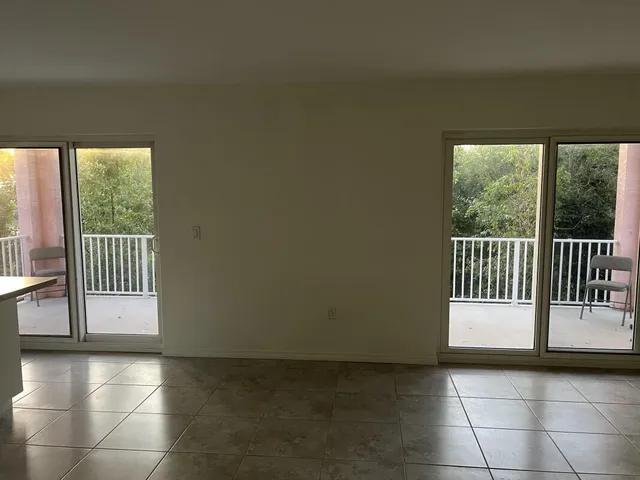 a view of a hallway with a porch