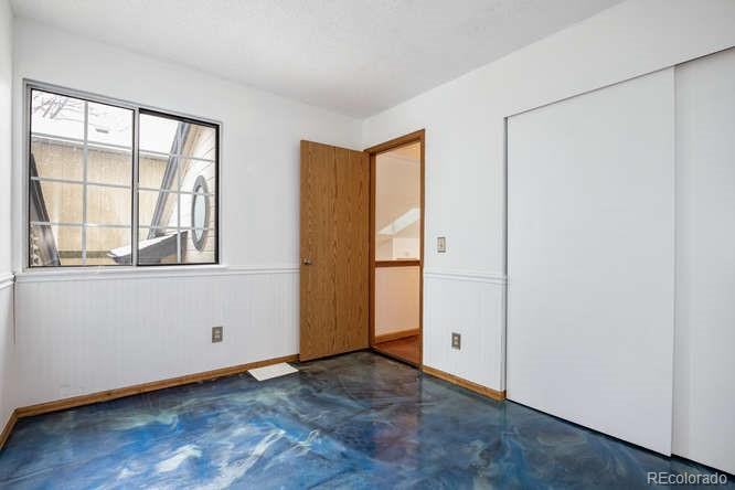 567 James Street Highlands Ranch, CO 80126 - Photo 12 of 17 an empty room with a window