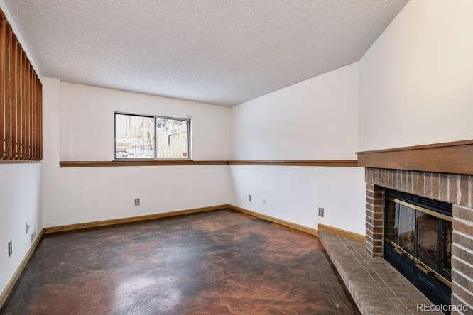 567 James Street Highlands Ranch, CO 80126 - Photo 13 of 17 an empty room with windows