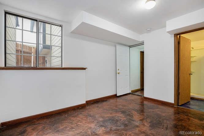 567 James Street Highlands Ranch, CO 80126 - Photo 14 of 17 an empty room with a window