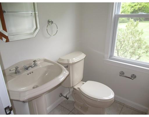 70 East Longmeadow Road Hampden, MA 01036 - Photo 13 of 38 a bathroom with a sink a toilet and a mirror