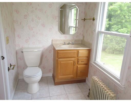 70 East Longmeadow Road Hampden, MA 01036 - Photo 15 of 38 a bathroom with a granite countertop toilet and a sink