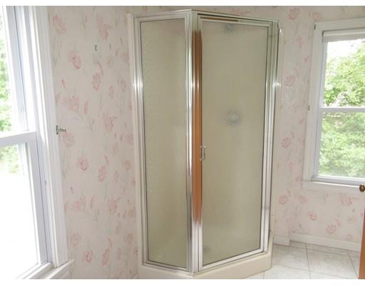 70 East Longmeadow Road Hampden, MA 01036 - Photo 16 of 38 a bathroom with a glass shower door