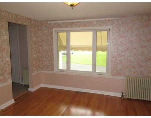 70 East Longmeadow Road Hampden, MA 01036 - Photo 9 of 38 an empty room with wooden floor and windows