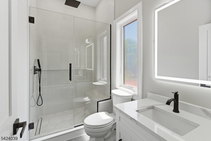 45 Kildee Road Belle Mead, NJ 08502 - Photo 30 of 43 a bathroom with a sink a toilet and shower