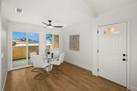 a work room with furniture and a window