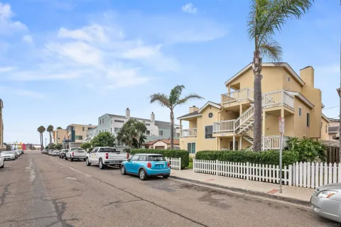 a view of a street in front of a house
