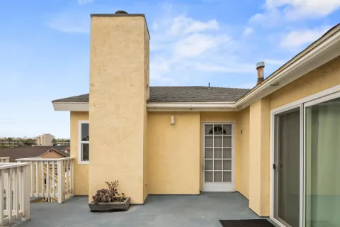 a view of balcony with furniture