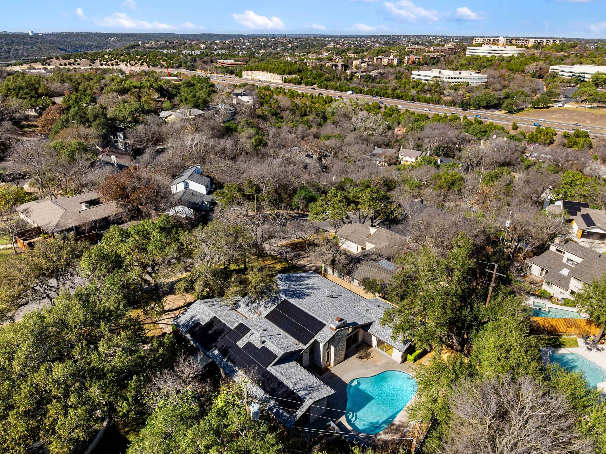 8805 Mountain Ridge Drive Austin, TX 78759 - Photo 29 of 30 an aerial view of multiple house