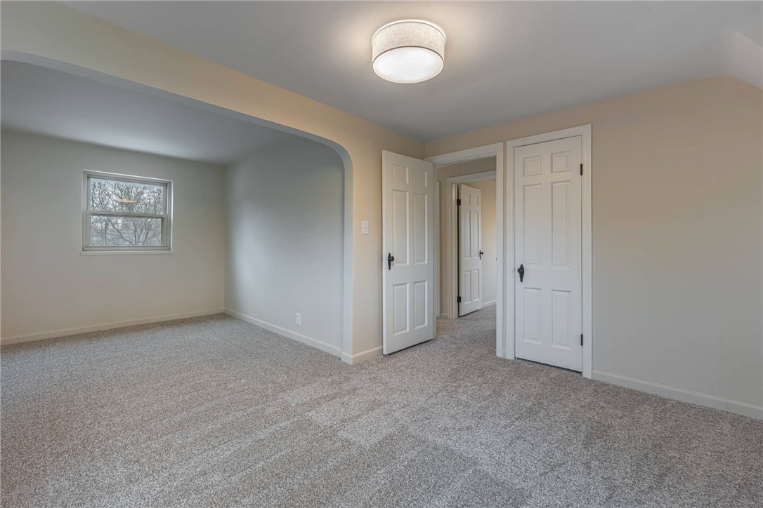 1012 Hampshire Road Dayton, OH 45419 - Photo 27 of 39 This bright and airy room features soft carpeting and offers versatile living space.