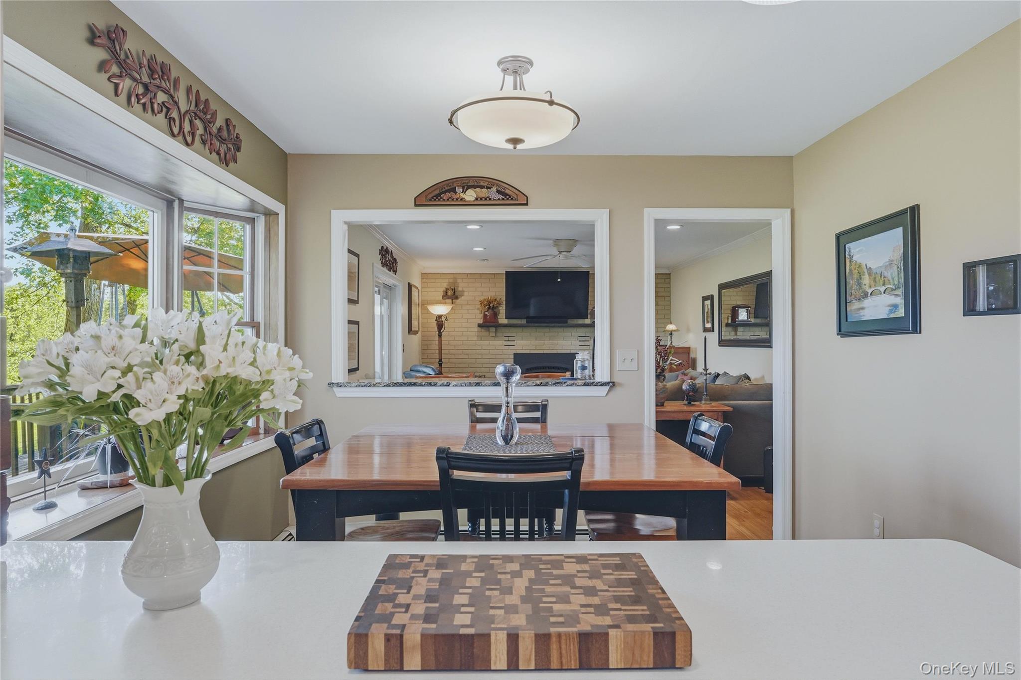 36 River Glen Road Wallkill, NY 12589 - Photo 12 of 47 a view of a dining room with furniture and a chandelier