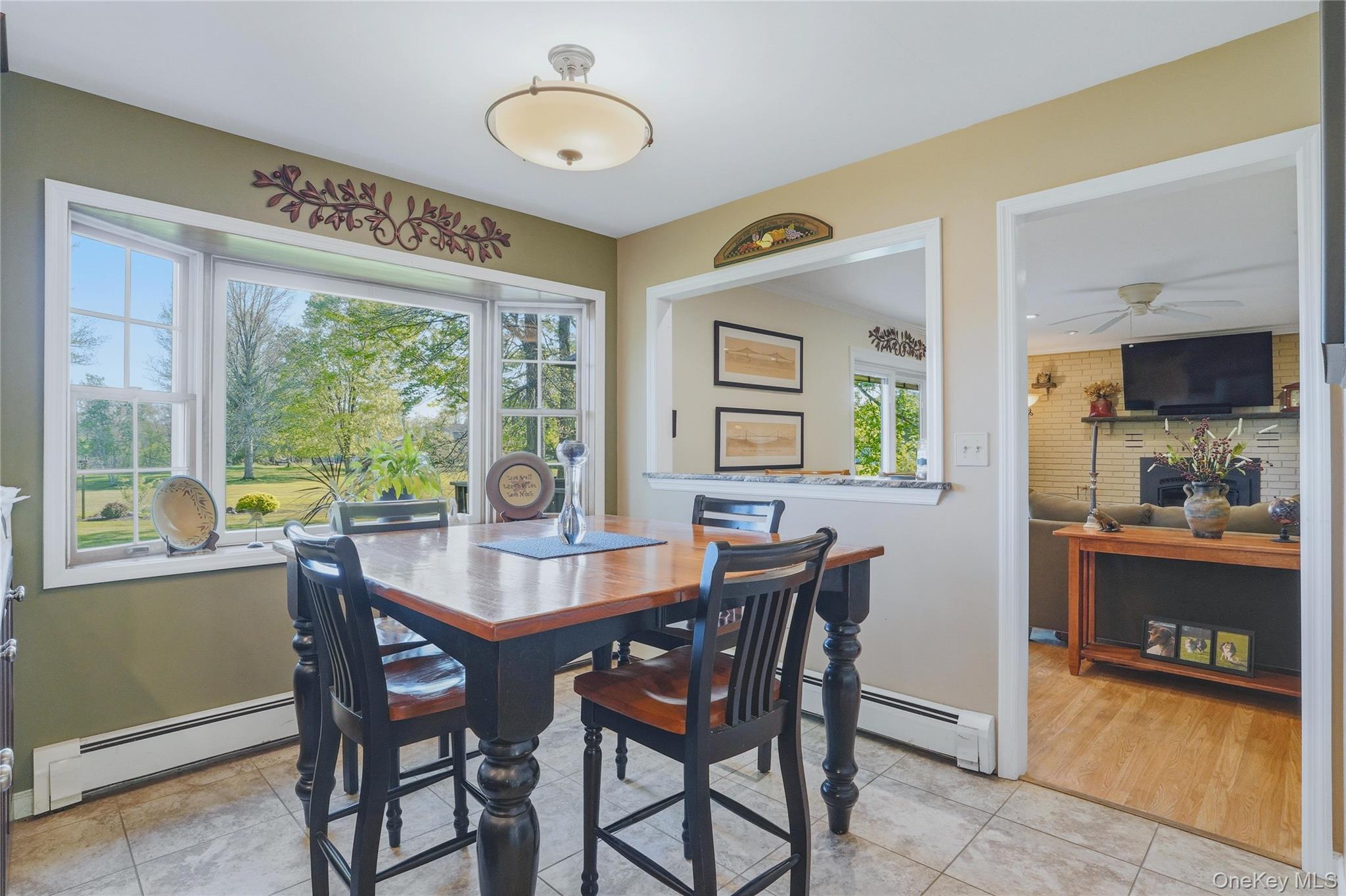36 River Glen Road Wallkill, NY 12589 - Photo 13 of 47 a dining room with furniture and window