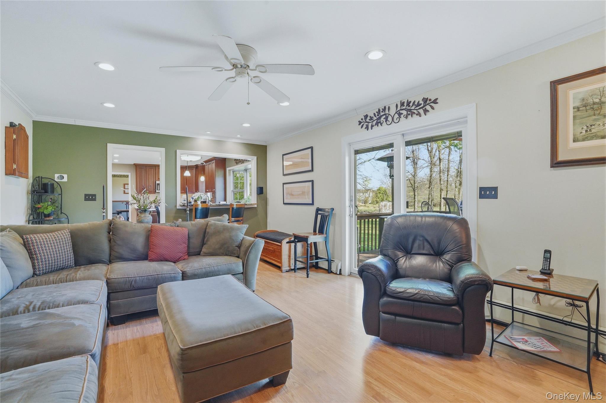 36 River Glen Road Wallkill, NY 12589 - Photo 16 of 47 a living room with furniture and a large window