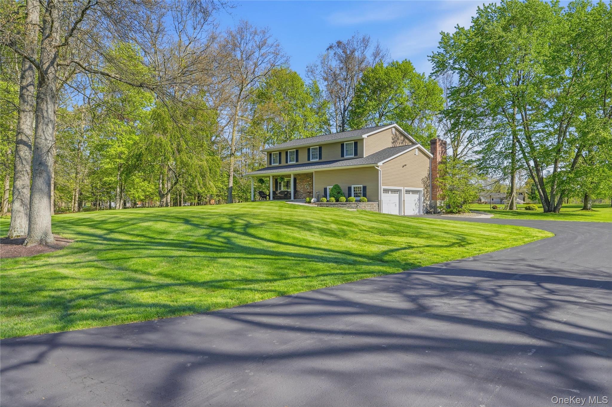 36 River Glen Road Wallkill, NY 12589 - Photo 2 of 47 a house view with a outdoor space