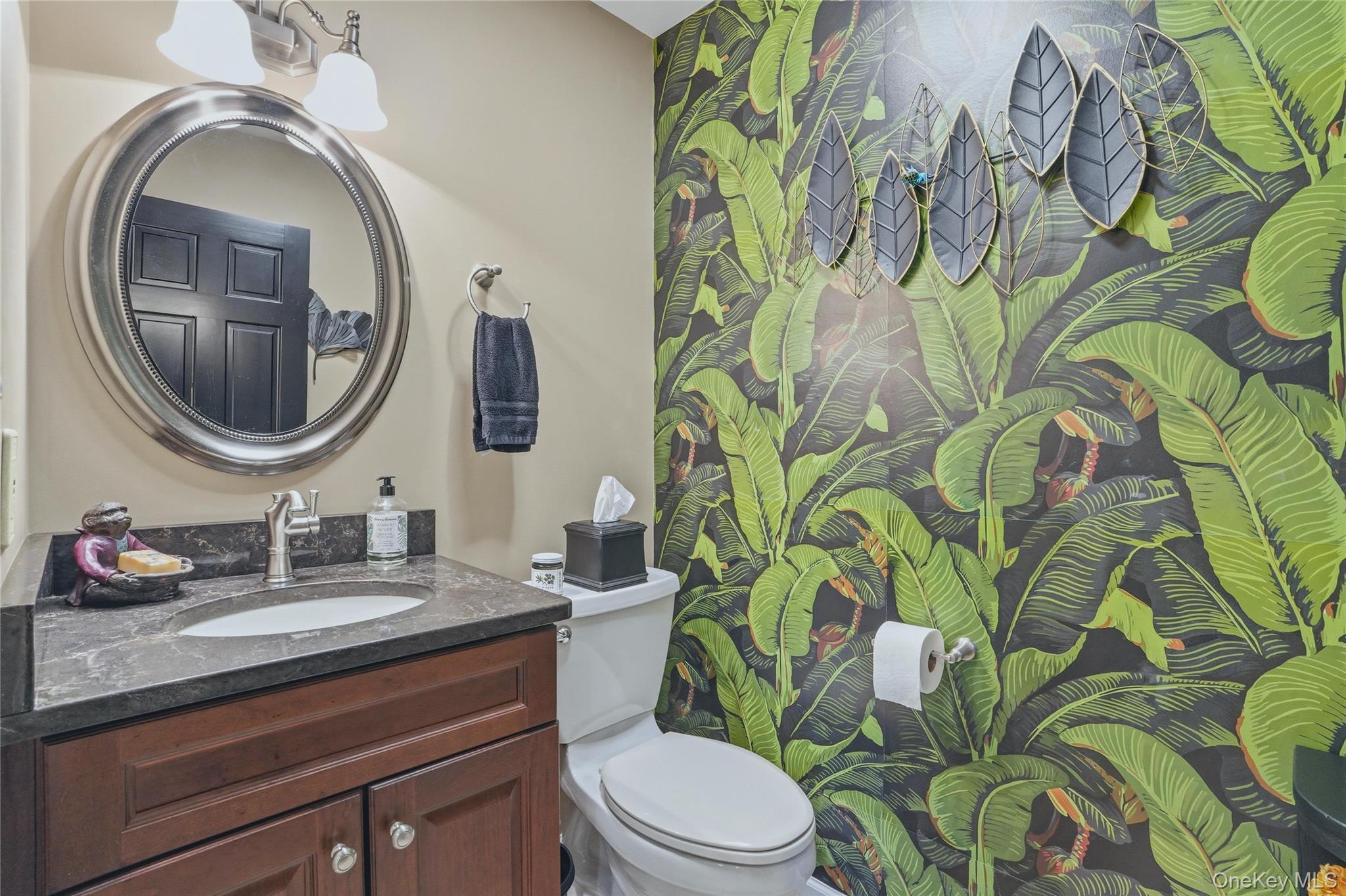 36 River Glen Road Wallkill, NY 12589 - Photo 21 of 47 a bathroom with a toilet sink and mirror