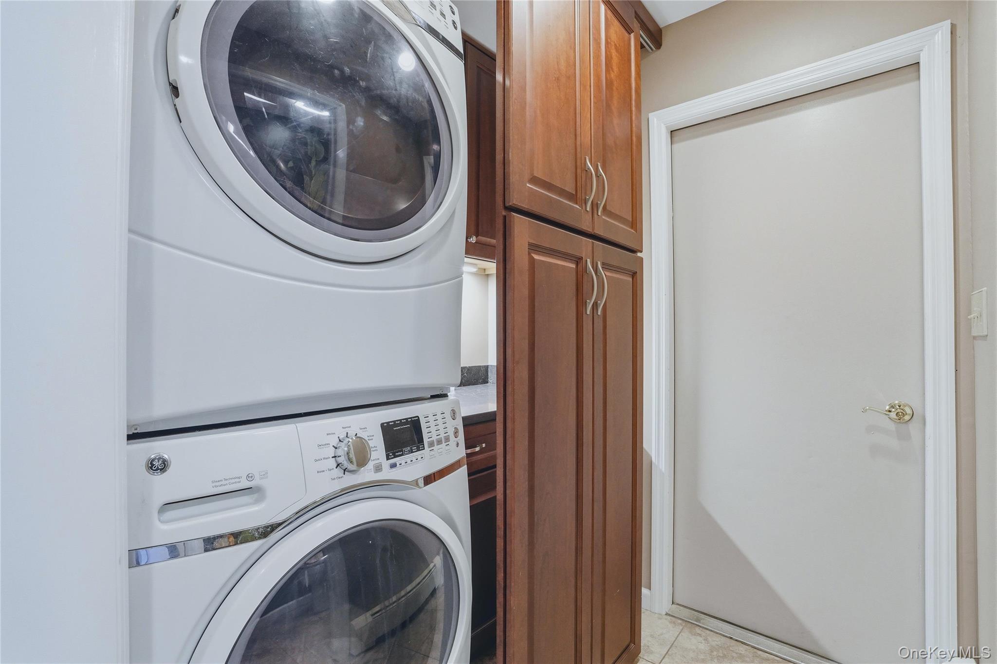 36 River Glen Road Wallkill, NY 12589 - Photo 22 of 47 a utility room with dryer and washer