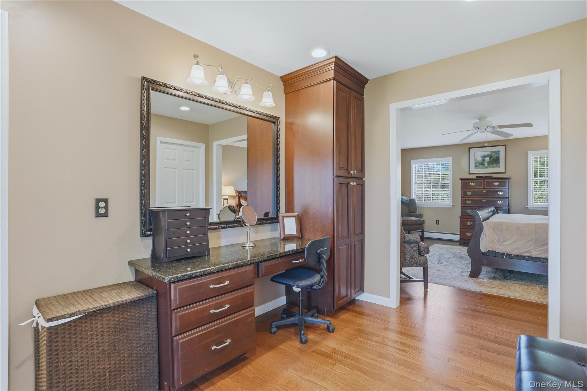 36 River Glen Road Wallkill, NY 12589 - Photo 29 of 47 a en suite bathroom with a granite countertop sink and a mirror