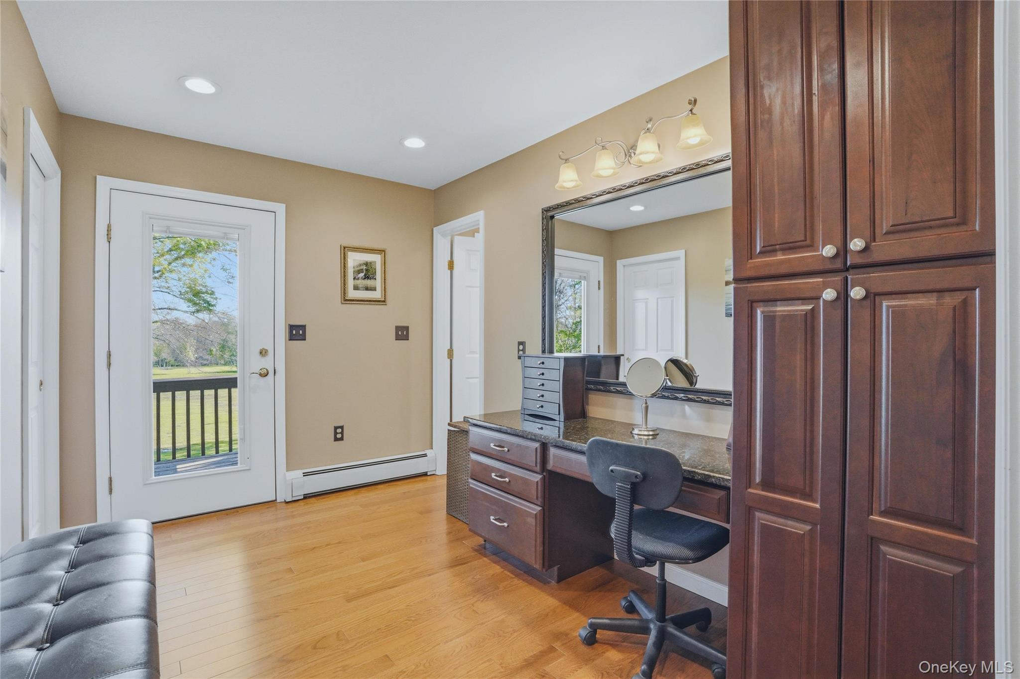 36 River Glen Road Wallkill, NY 12589 - Photo 30 of 47 a view of a workspace with furniture and a window
