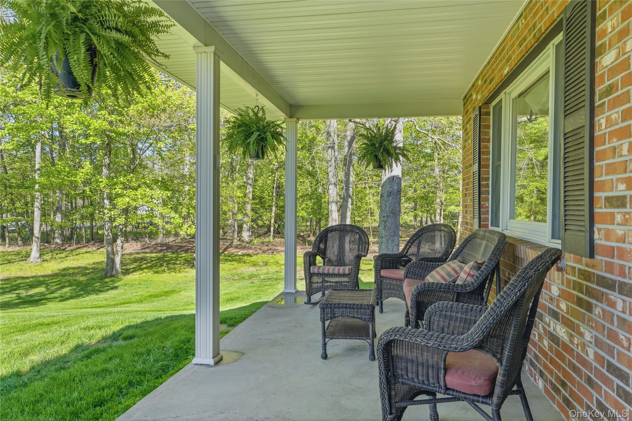 36 River Glen Road Wallkill, NY 12589 - Photo 3 of 47 a living room with yard floor to ceiling windows and pool