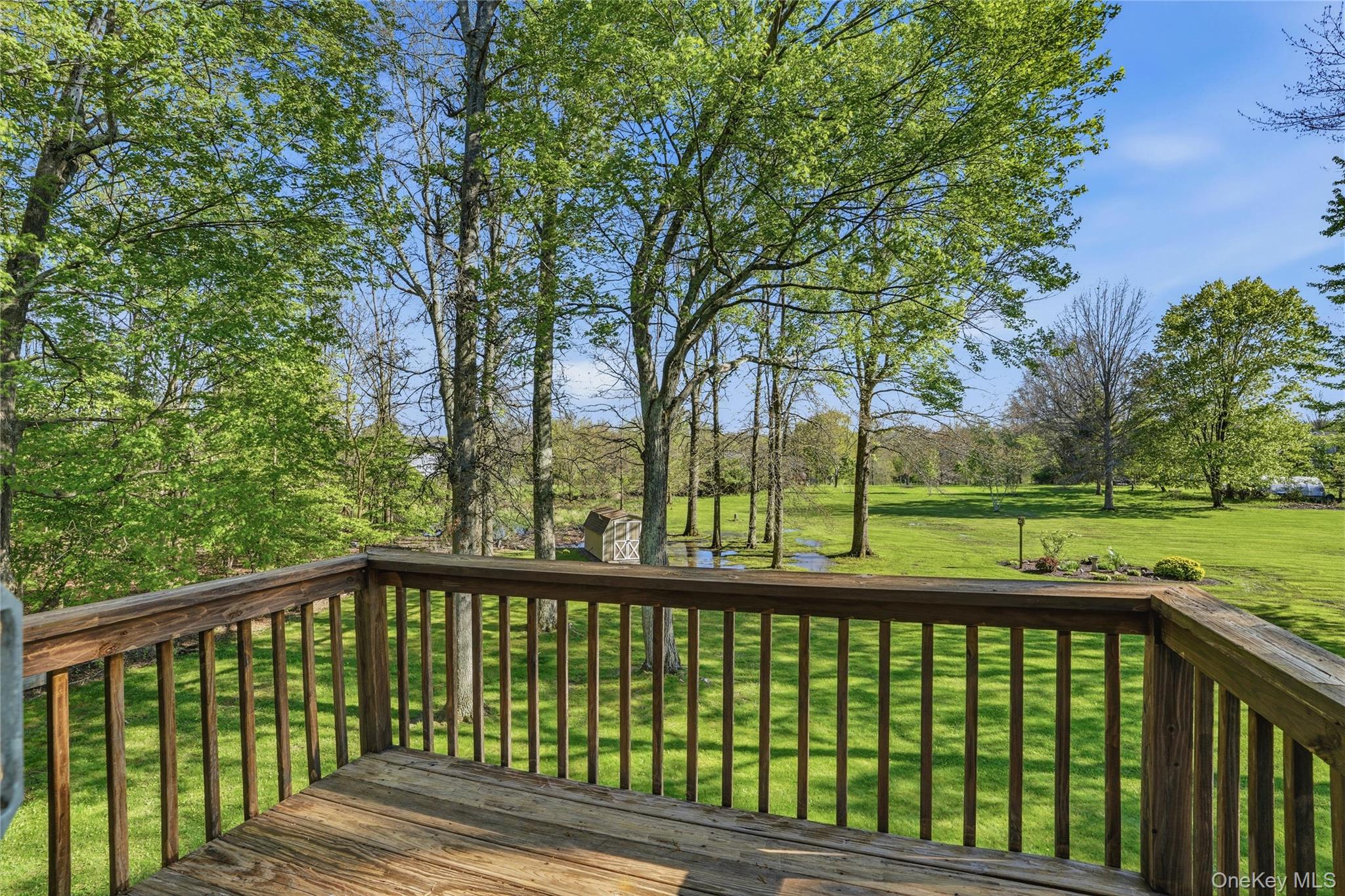 36 River Glen Road Wallkill, NY 12589 - Photo 31 of 47 a view of a wooden deck
