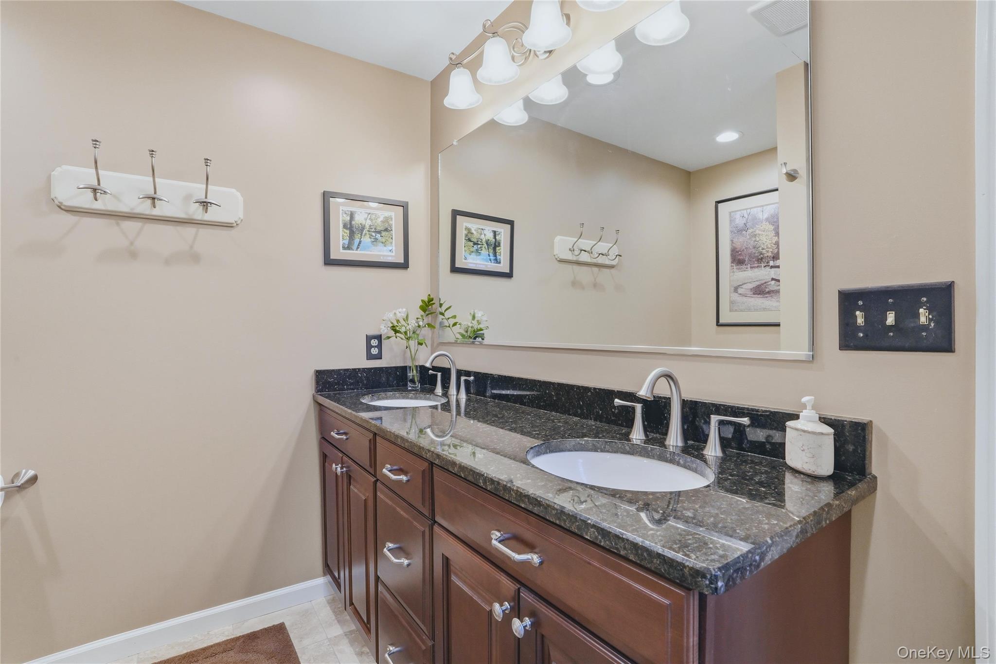 36 River Glen Road Wallkill, NY 12589 - Photo 32 of 47 a sink and a mirror
