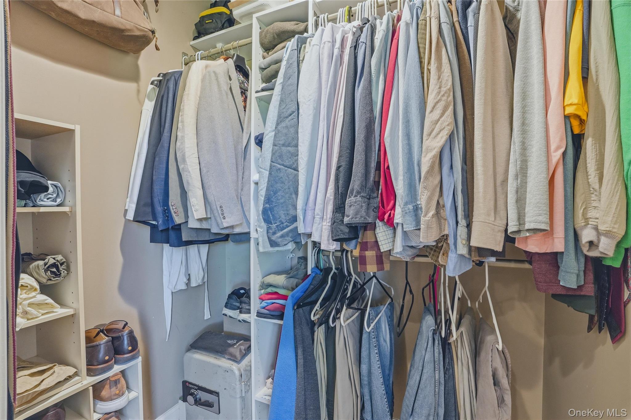 36 River Glen Road Wallkill, NY 12589 - Photo 34 of 47 a view of walk in closet with clothes and shoes