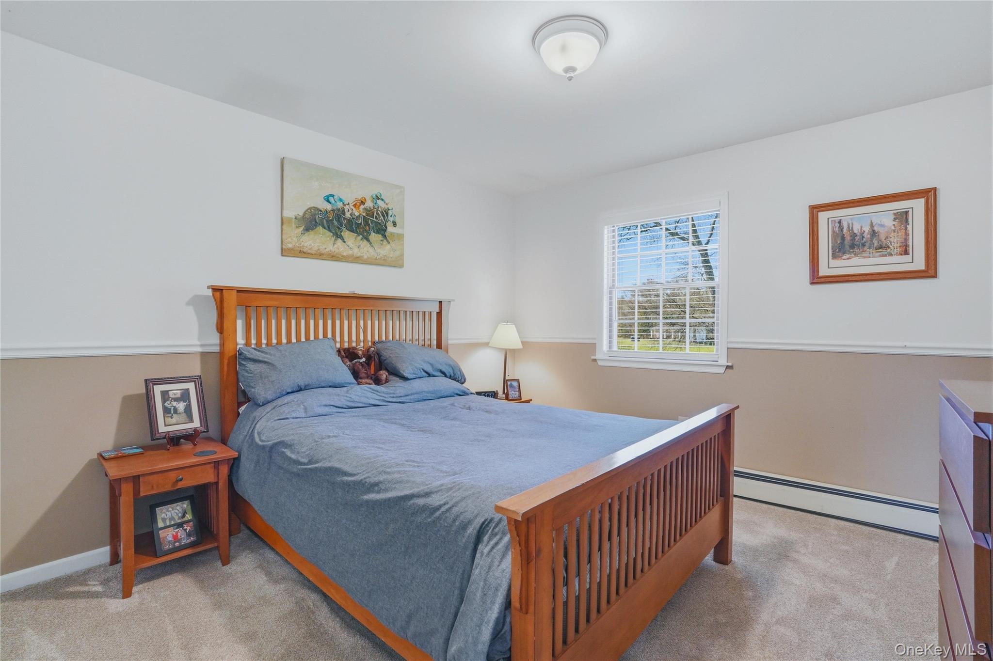 36 River Glen Road Wallkill, NY 12589 - Photo 35 of 47 a bedroom with a bed and a window