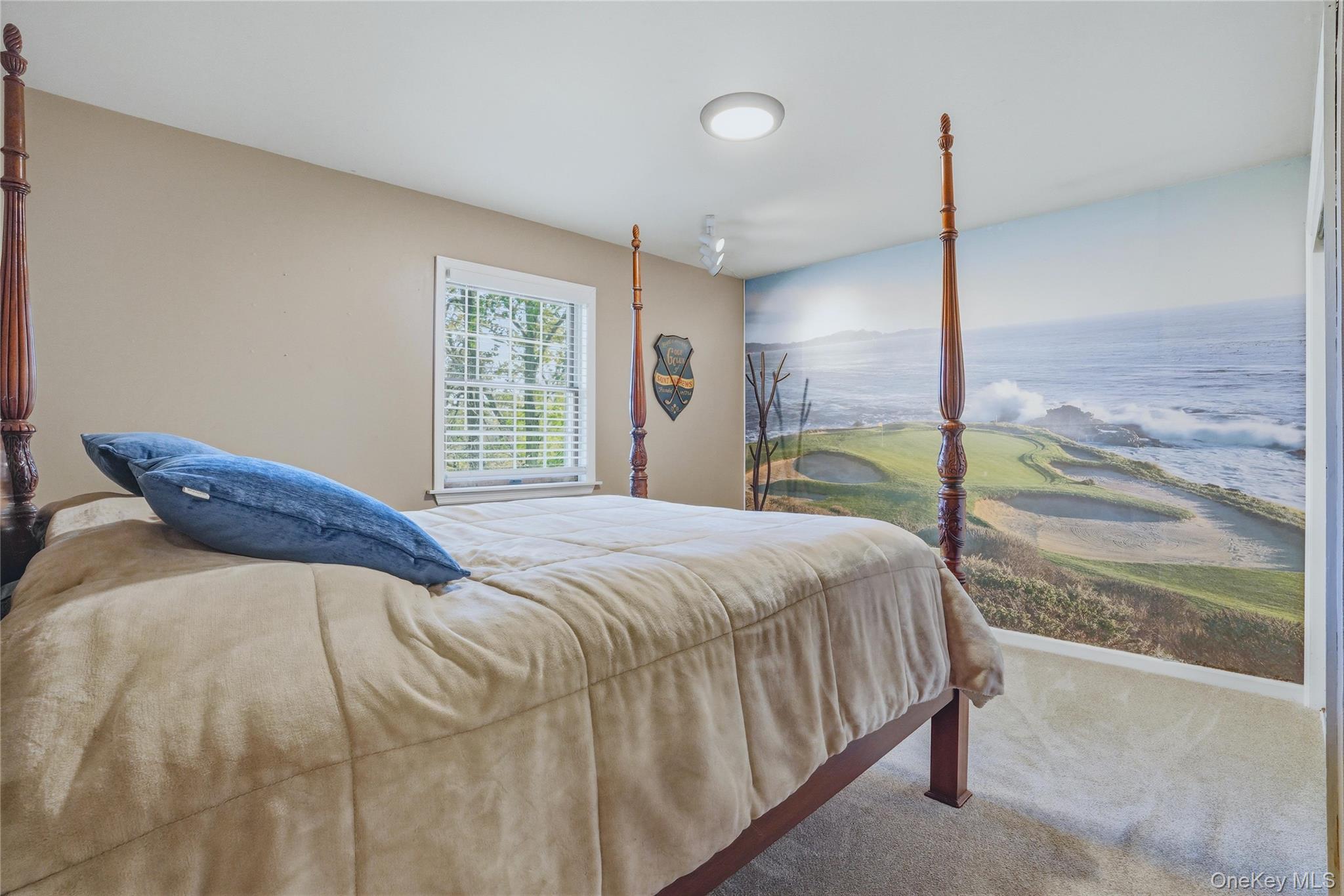 36 River Glen Road Wallkill, NY 12589 - Photo 36 of 47 a bedroom with a bed and large window